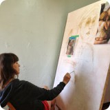 Anna Rittens, Lori's lovely daughter, chose the traditional method of sketching an inspirational image to scale on the canvas.