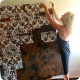 Heather is known in the Central New York Finger Lakes region for creating exquisite ornamental faux finishes.   Working in the day lit studio, she uses Modello decorative masking patterns to layer a finish that would make a great feature wall effect.