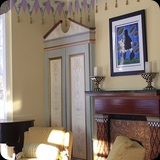 8 Music Room; Ornamental Ceiling, Wall Banner, Armoire, and Fireplace Surround