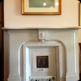 59  Chalk paint & paste wax finish on a living room fireplace mantle, which was originally black