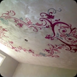 61  Lusterstone finish on walls & ceiling with large scale ornamental ceiling medallion for a bedroom.