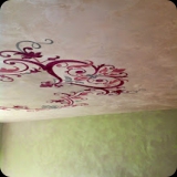 62  Lusterstone finish on walls & ceiling with large scale ornamental ceiling medallion for a bedroom.