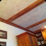 67  2-tone Lusterstone ceiling accent for a family room.