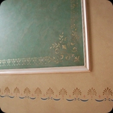64 Detail of Tamise Leaf Gilded Ornamental Panel, Tea-stained Frame, Colorwashed Walls, & Stencil Border