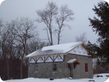 The new trusses, loft construction, and roof were cinched up just in time for a long New York Winter.