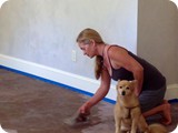 Heather applying the mocha colored Skimstone decorative concrete floor base-coat to the living-room radiant heat substrate...one of her signature hand-troweled finishes for floors & countertops