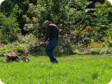 While Heather was busy working on the gardens, dear friend & neighbor, Frank Moran, helped mow the schoolhouse yard.