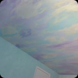 43  Hand-painted fantasy sky w/ color-washed walls for a child's bedroom