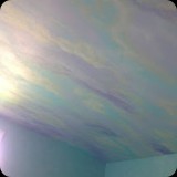 42  Hand-painted fantasy sky w/ color-washed walls for a child's bedroom
